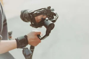 Person Holding Video Camera